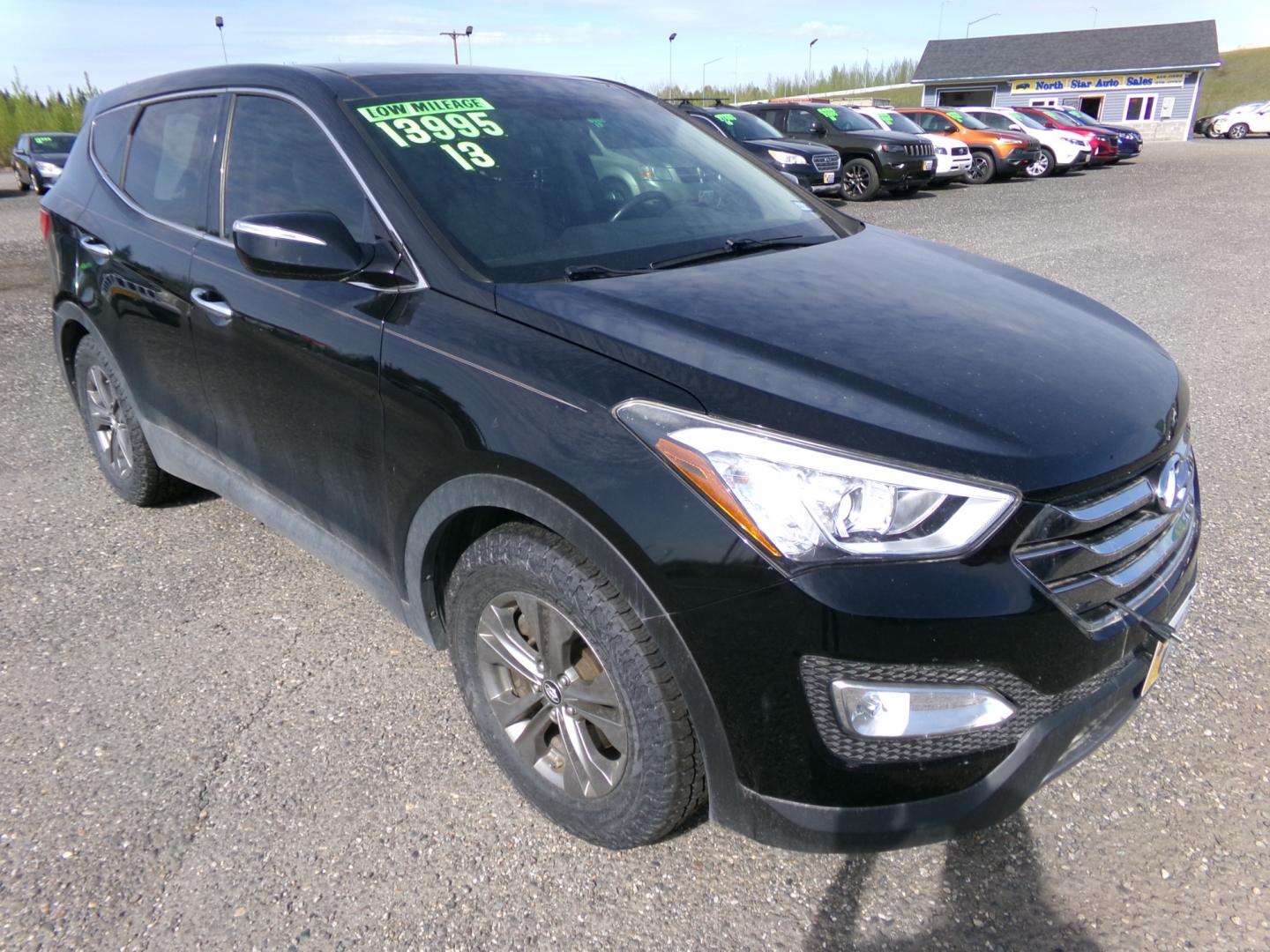 2013 Black Hyundai Santa Fe Sport 2.4 FWD (5XYZU3LB9DG) with an 2.4L L4 DOHC 16V engine, 6-Speed Automatic transmission, located at 2630 Philips Field Rd., Fairbanks, AK, 99709, (907) 458-0593, 64.848068, -147.780609 - Photo#0